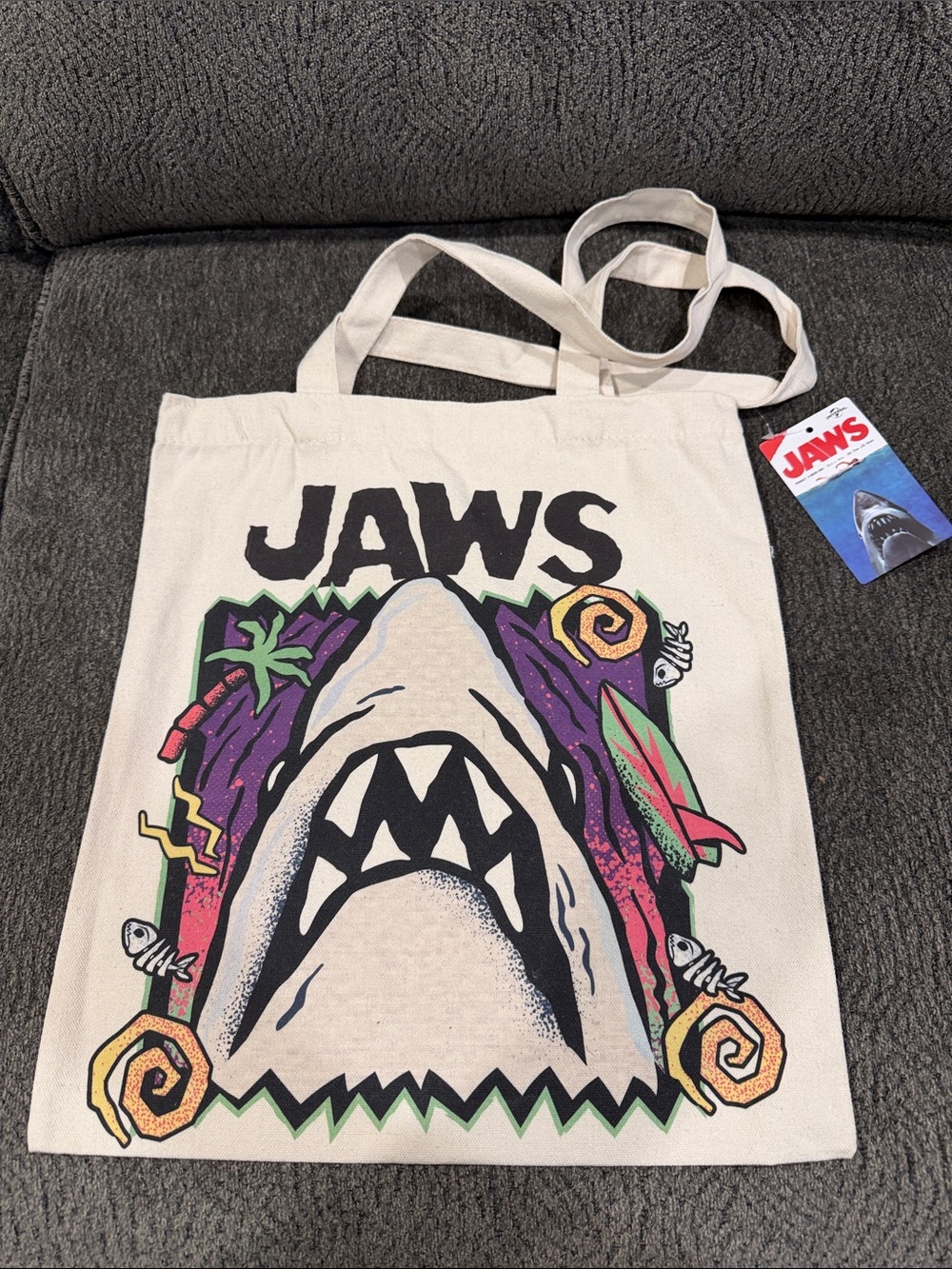 Universal JAWS Cream Canvas Tote with Multicolor Shark Graphic